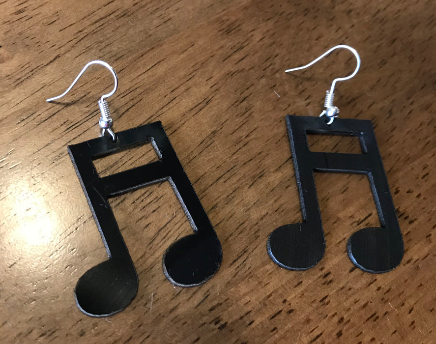 double note earings made from recycled vinyl records